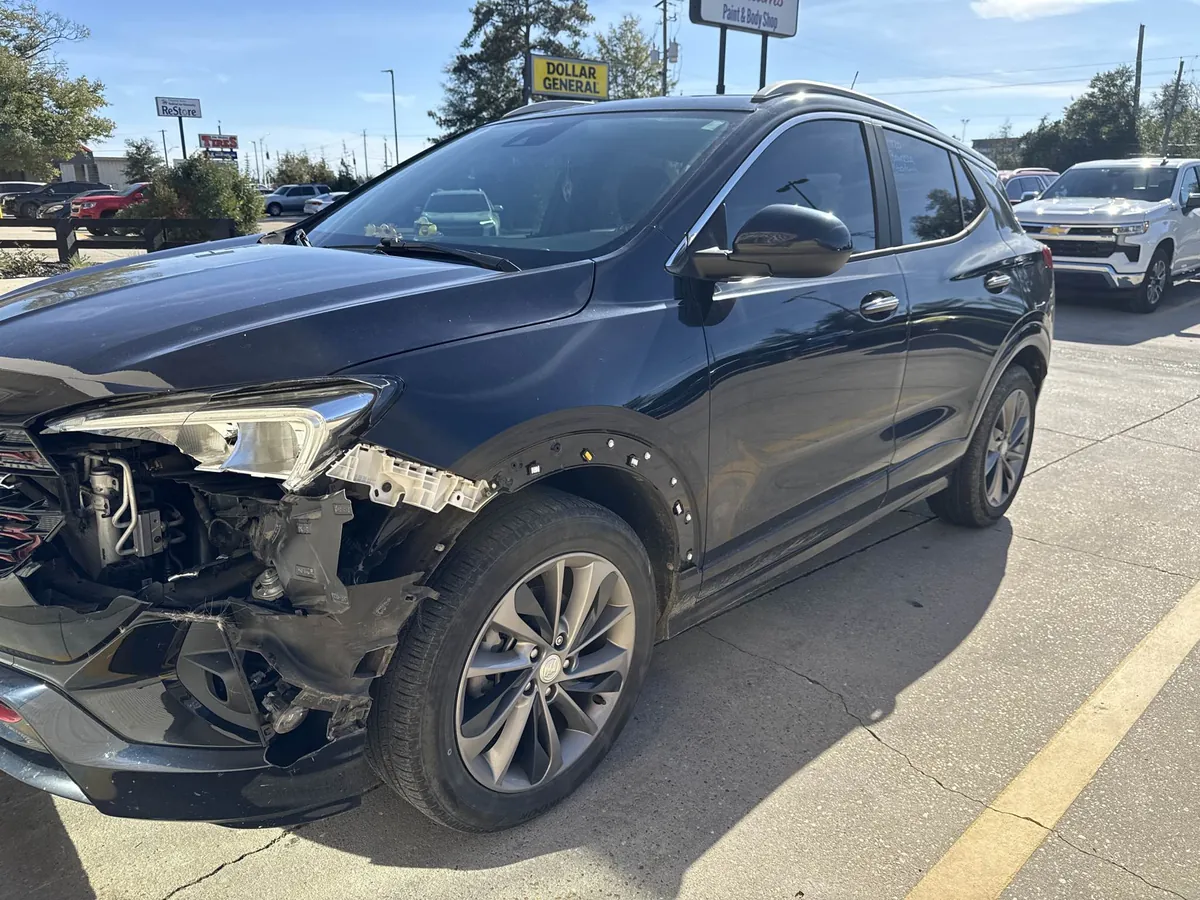 Collision damage on a Buick Encore before repair at Williams Paint & Body Shop