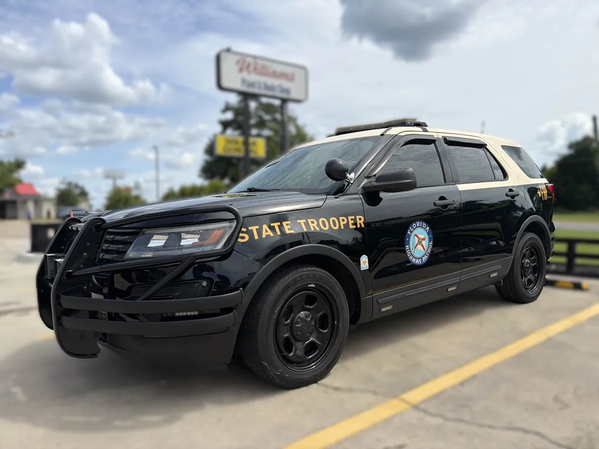 After OEM-spec front-end collision repair on a 2018 Ford Police Interceptor — Florida Highway Patrol unit