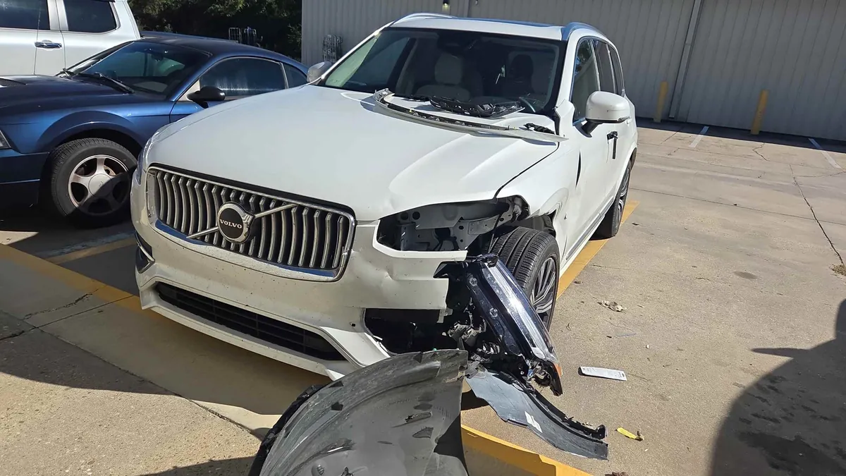 Collision damage on a 2024 Volvo XC90 before repair