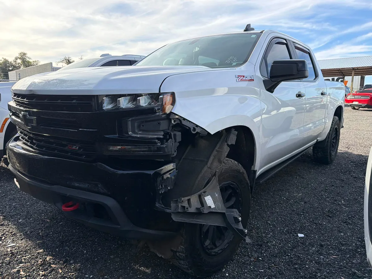 Deer impact damage on a 2021 Chevrolet Silverado Z71 before repair
