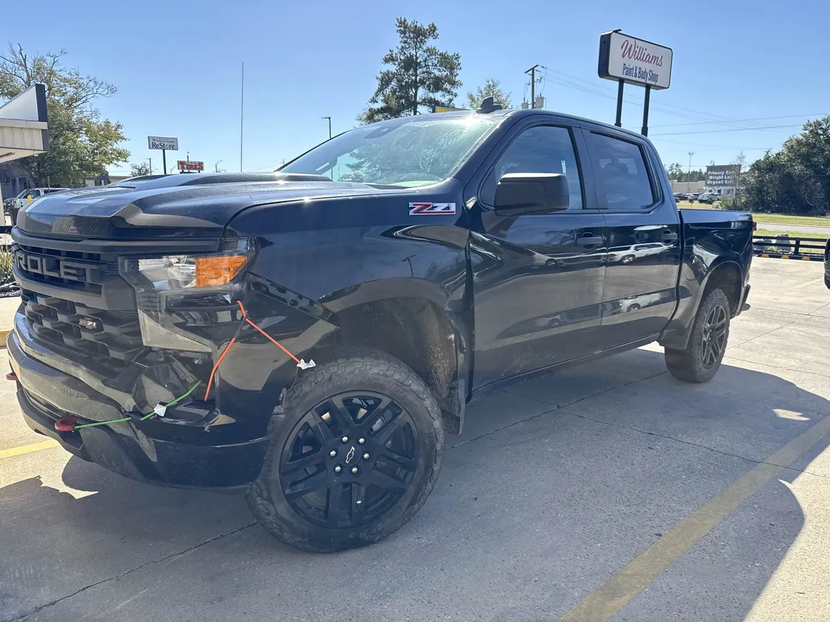 Front-end collision damage on a 2024 Chevrolet Silverado Z71 before repair