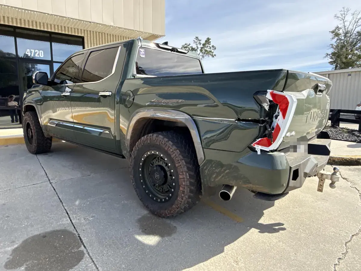 Rear-end collision damage on a 2023 Toyota Tundra before repair